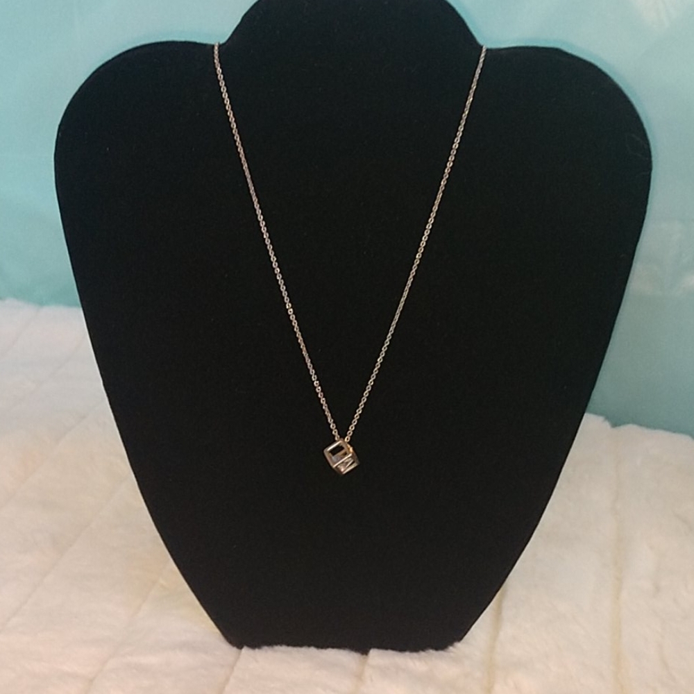Stunning diamond in cube necklace